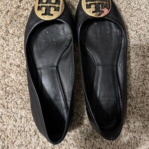 Tory Burch Black Flats with Gold Emblem
